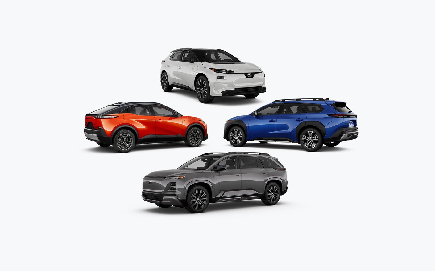Four Subaru electric vehicles.